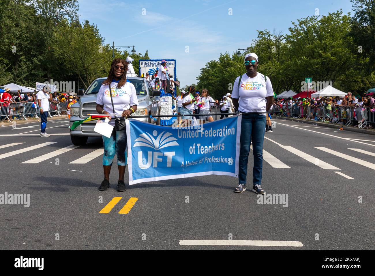 The West Indian Labor Day Parade with women holding a United Federation ...