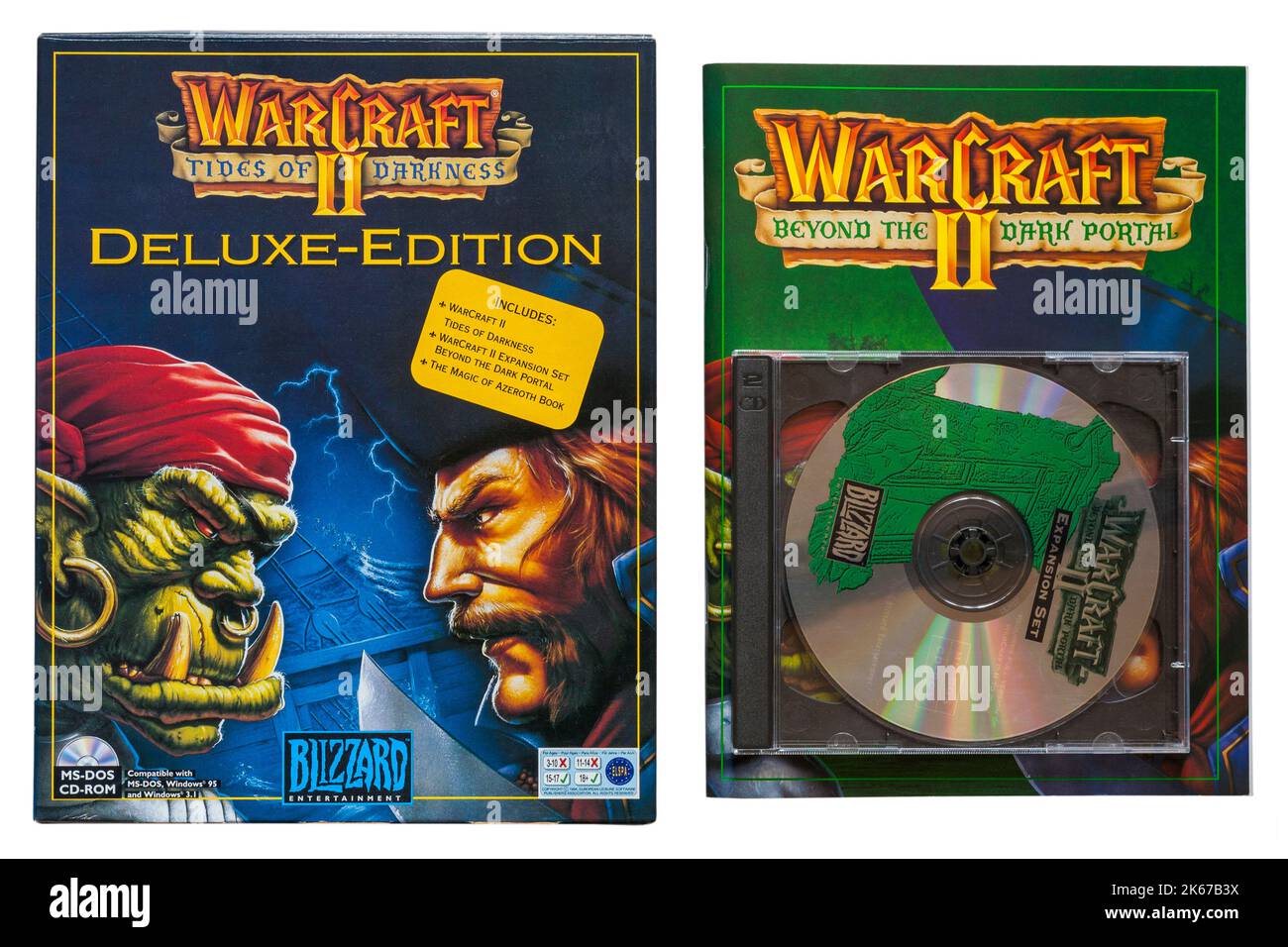 Warcraft II Tides of Darkness deluxe-edition computer game with Warcraft II beyond the dark portal book and disc isolated on white background Stock Photo