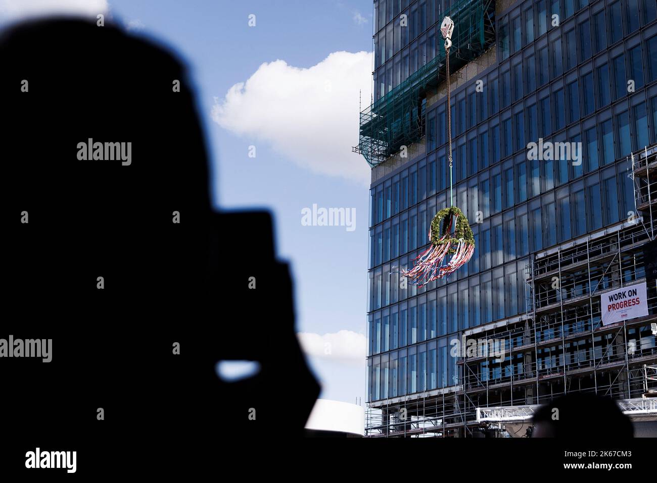 Topping Buildings Ritual Berlin, Germany. 12th Oct, 2022. Guests at the topping-out ceremony ...