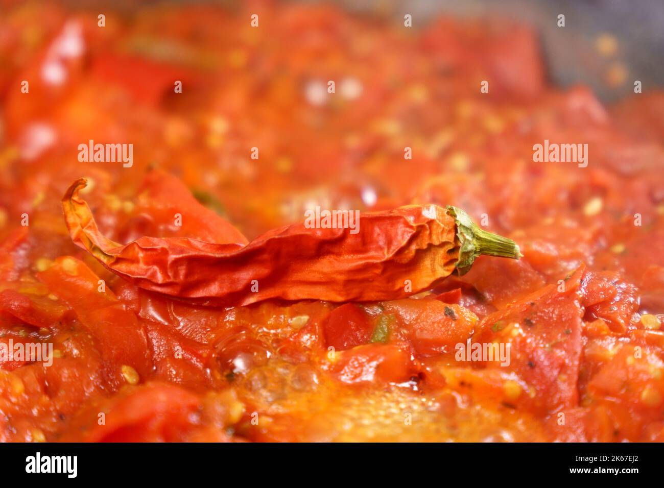 Chili hot sauce made from fermented dry de Cayenne chilies. Concept of