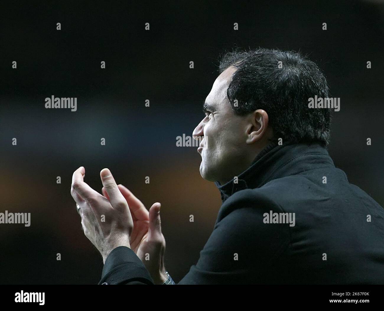 29th December 2012 - Barclays Premiership - Aston Villa Vs. Wigan Athletic - Wigan Athletic manager Roberto Martinez celebrates Wigan's 3rd goal scored by Arouna Kone of Wigan Athletic  - Photo: Paul Roberts / Pathos. Stock Photo