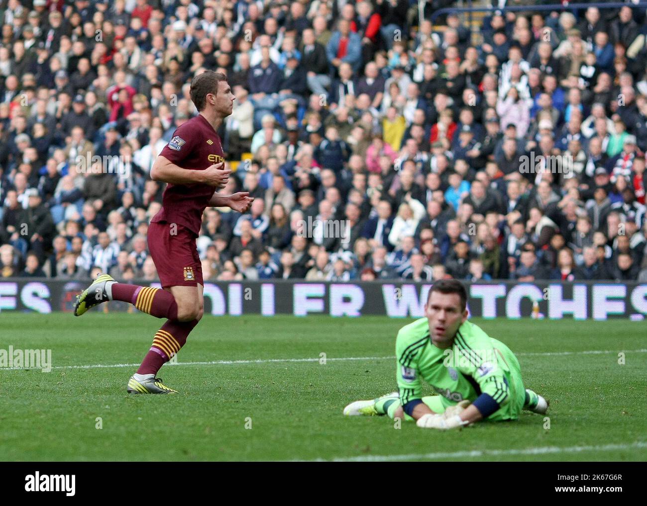 20th October 2012 - Barclays Premier League - West Bromwich Albion Vs. Manchester City - Edin Dzeko of Manchester City Wheels away after cooly slotting home to win the match for Manchester City. (1-2) - Photo: Paul Roberts / Pathos. Stock Photo