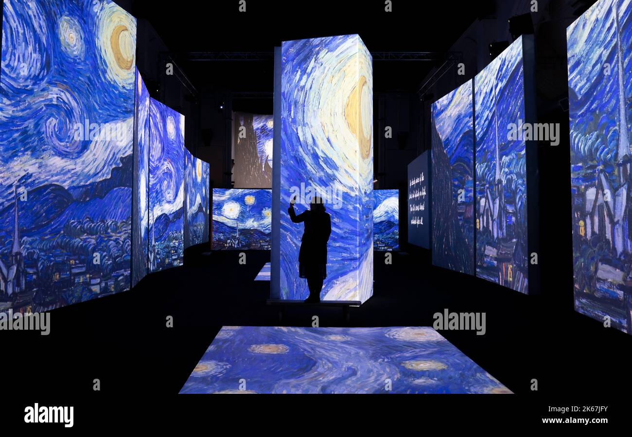 A woman takes a photo has the finishing touches are made ahead of the