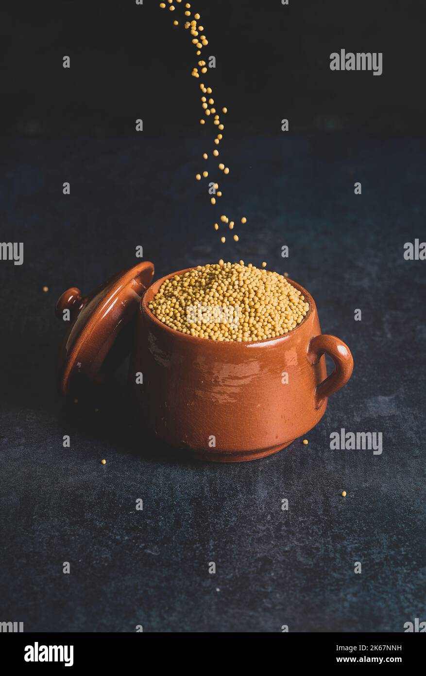 Yellow mustard in a ceramic bowl. Stock Photo