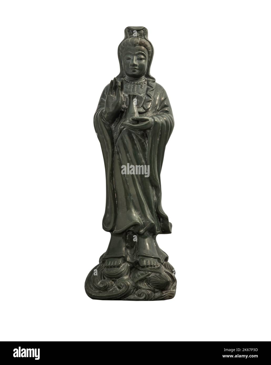 Figurine of Green Guan Yin Bodhisattva or Quan yin buddha statue (Goddess of mercy) isolated on white background with clipping path. Selective focus. Stock Photo