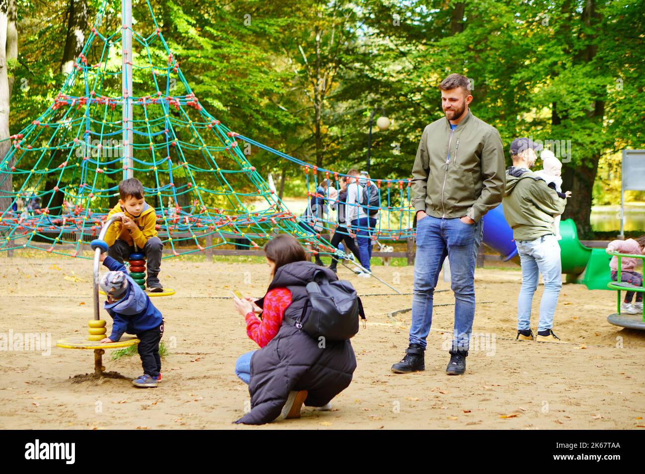 Parent playing kids in park hi-res stock photography and images - Alamy