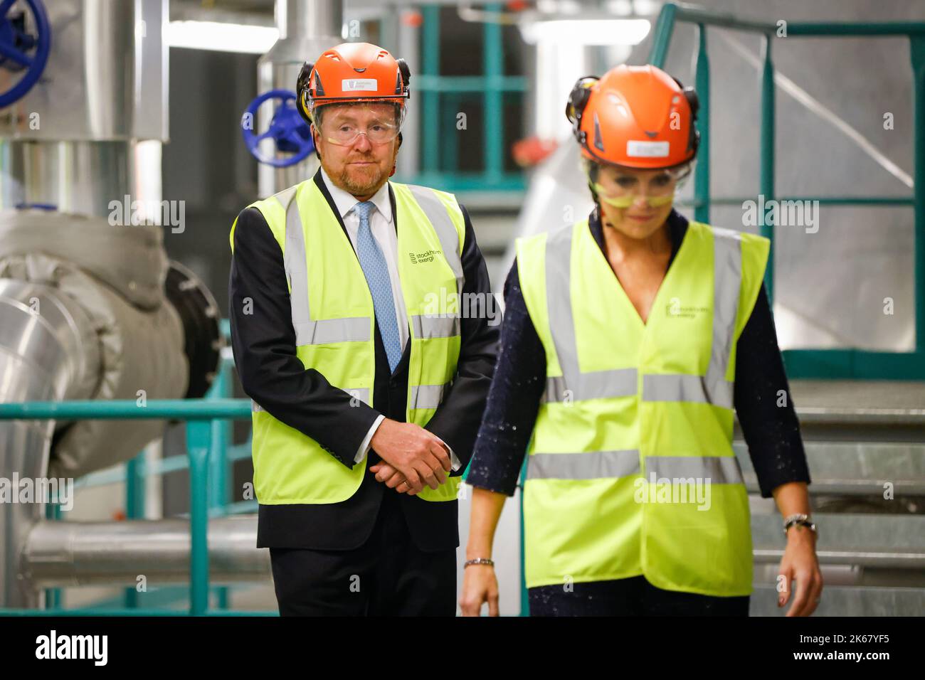 King Willem-Alexander and Queen Máxima wearing helmets while visiting ...