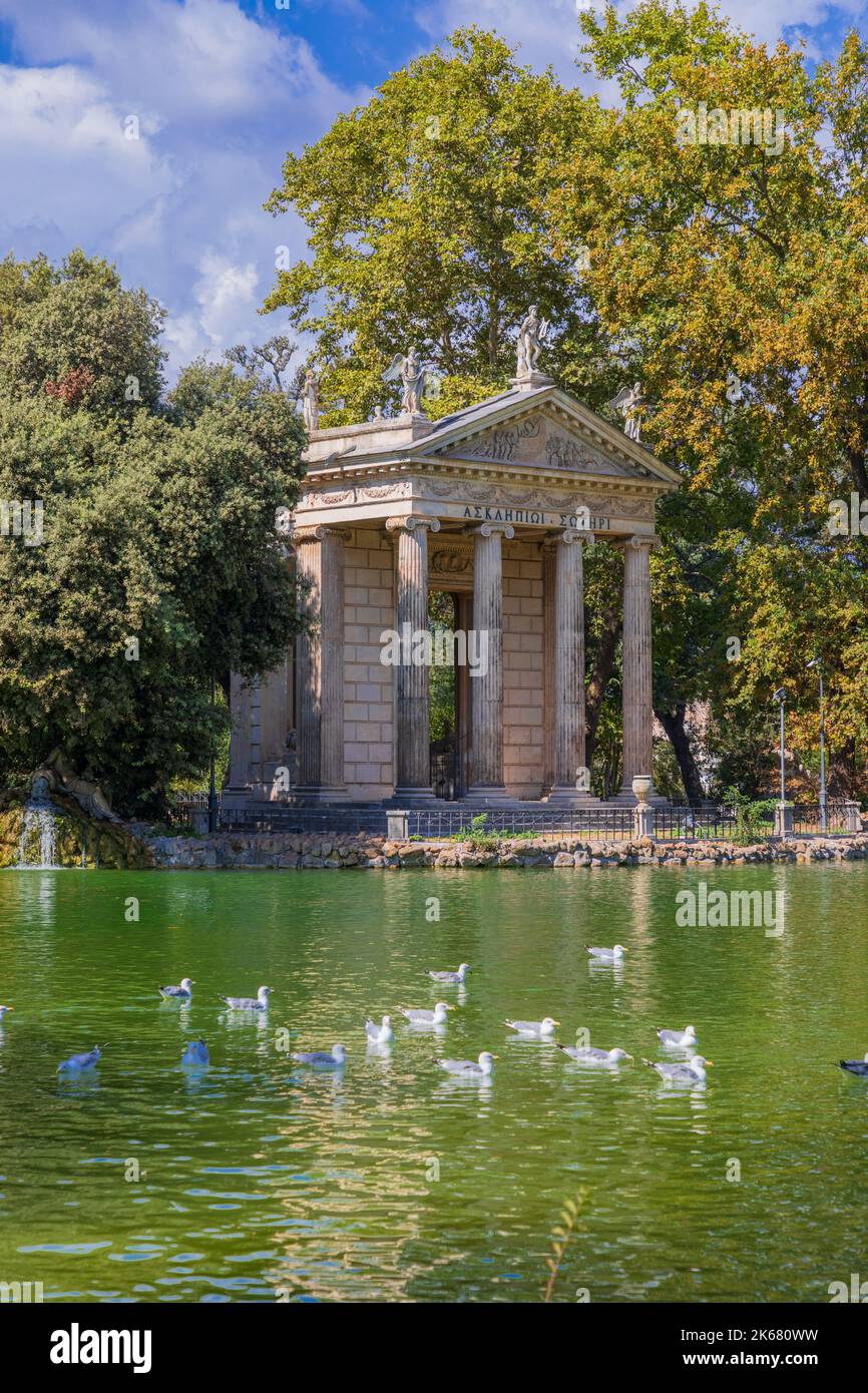 Temple of Asclepius situated in the middle of the small island on the artificial lake in Villa Borghese gardens , Rome, Italy. Stock Photo