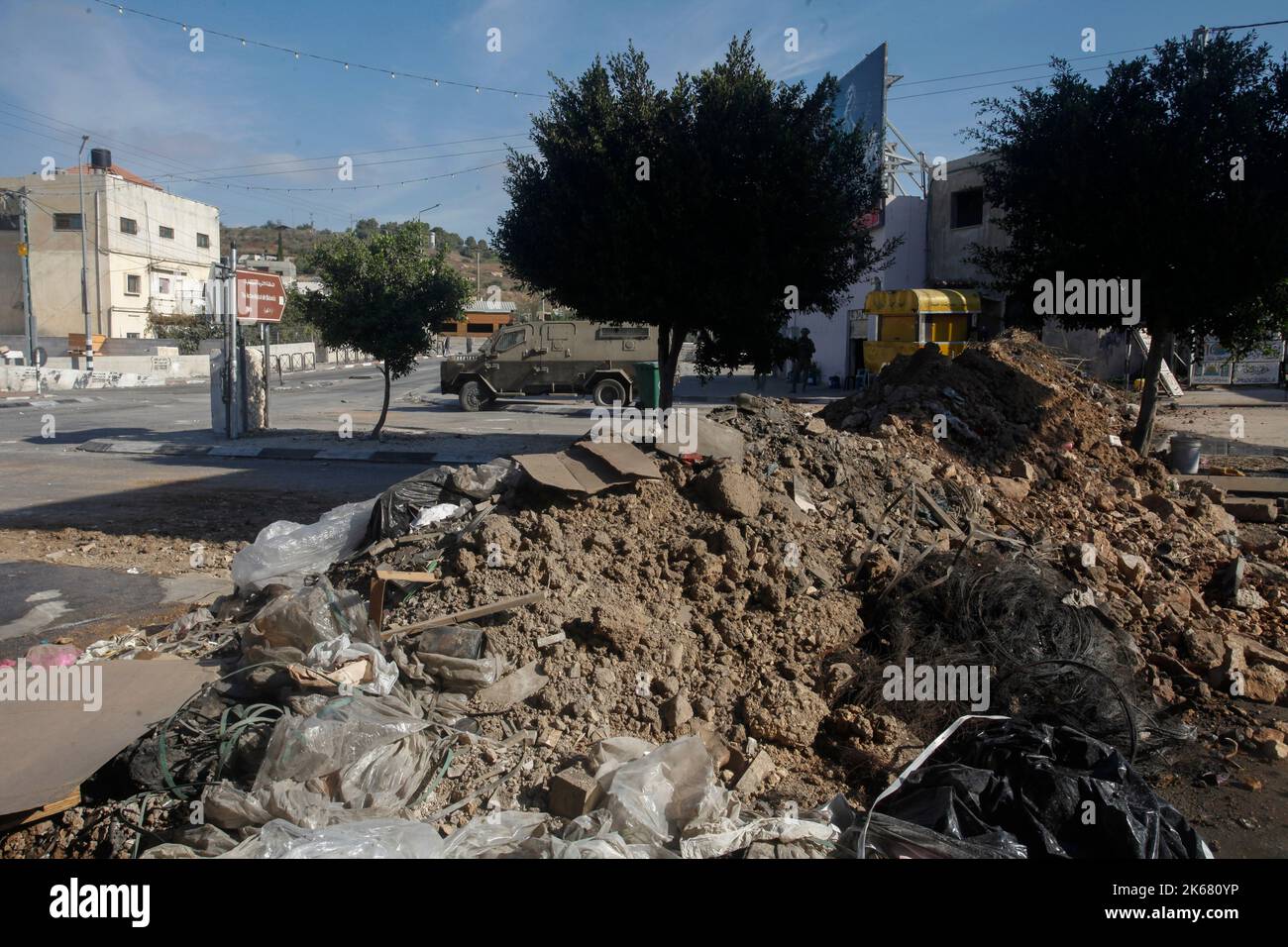 Nablus, Palestine. 12th Oct, 2022. Israeli army forces closed the western entrance to the city of Nablus with earth mounds, following the killing of an Israeli soldier at the gate of Shavei Shomron settlement in the West Bank. (Photo by Nasser Ishtayeh/SOPA Images/Sipa USA) Credit: Sipa USA/Alamy Live News Stock Photo