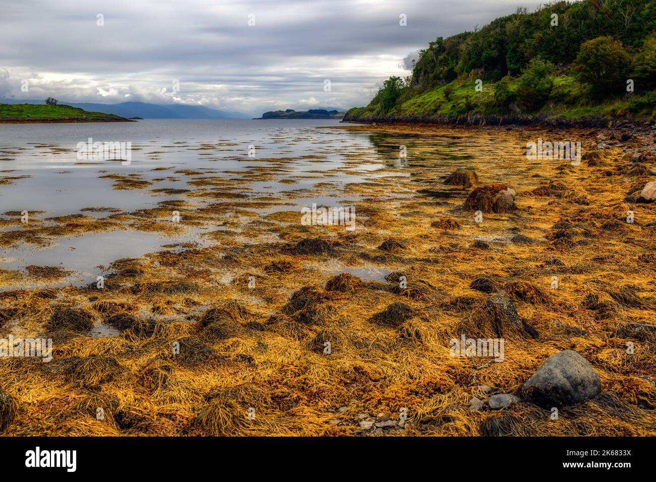 secluded bay on the west coast of The Isle of Lismore, Argyll, Scotland Stock Photo