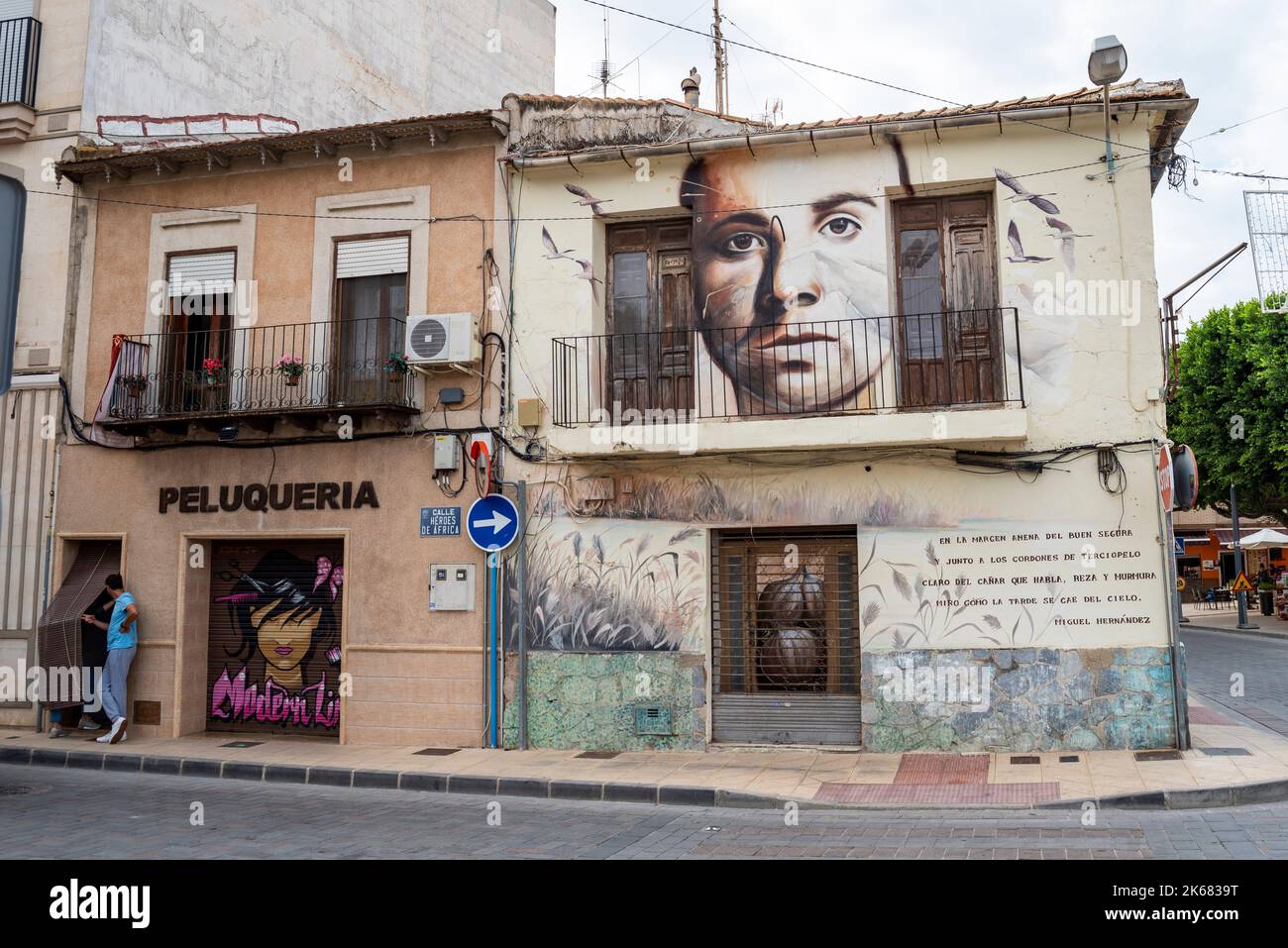 Large mural on side of a building in Rojales following the Rojales in painting festival designed to revitalise decaying buildings. Miguel Hernandez Stock Photo