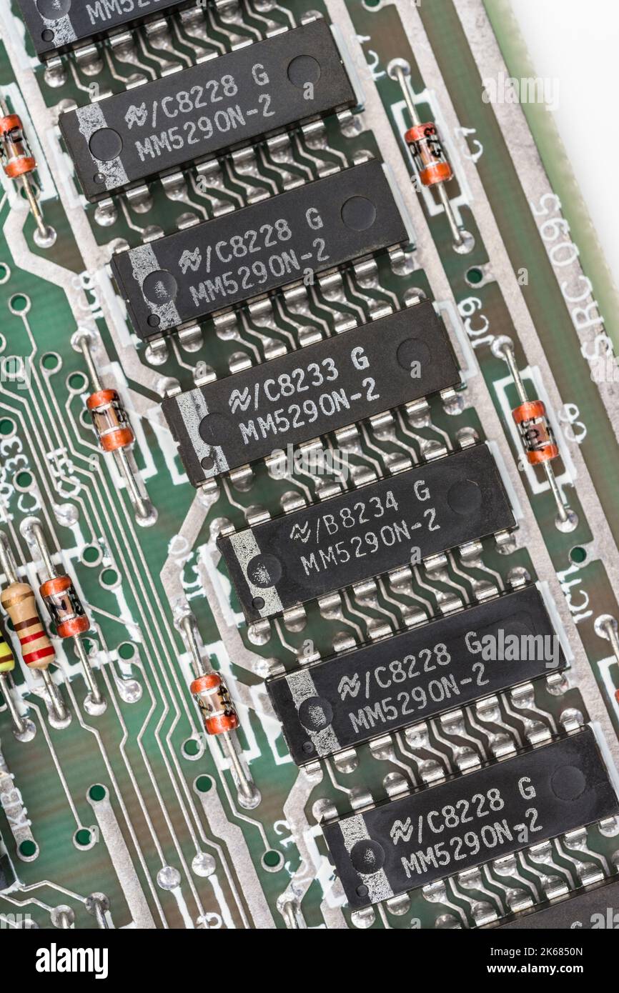 National Semiconductor Corporation 16384-bit Dynamic RAM chips on Series 2 Sinclair ZX Spectrum motherboard. Famous old UK legacy home computer. Stock Photo