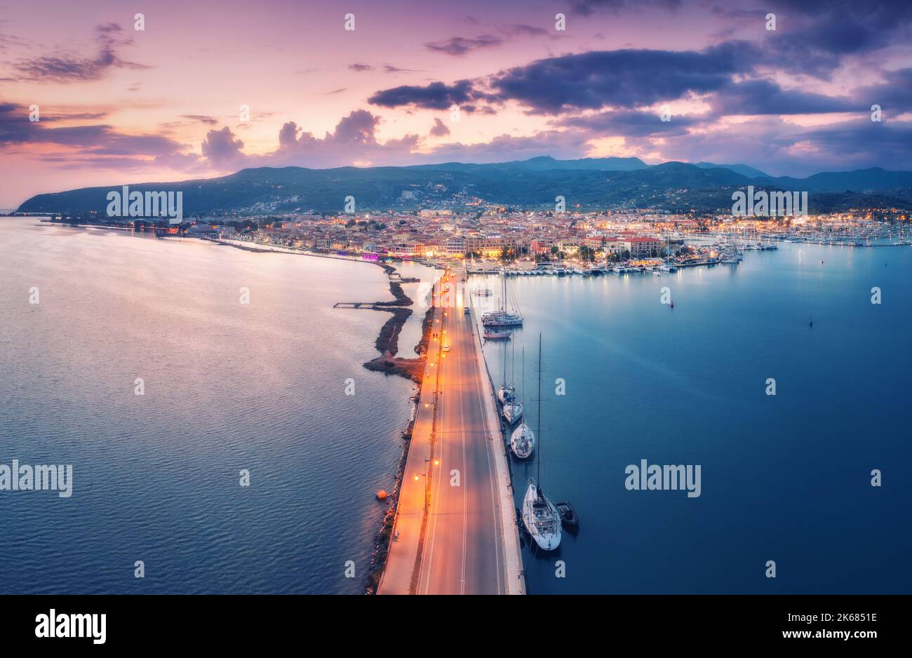 Aerial view of road and sea at night in Lefkada island, Greece Stock Photo