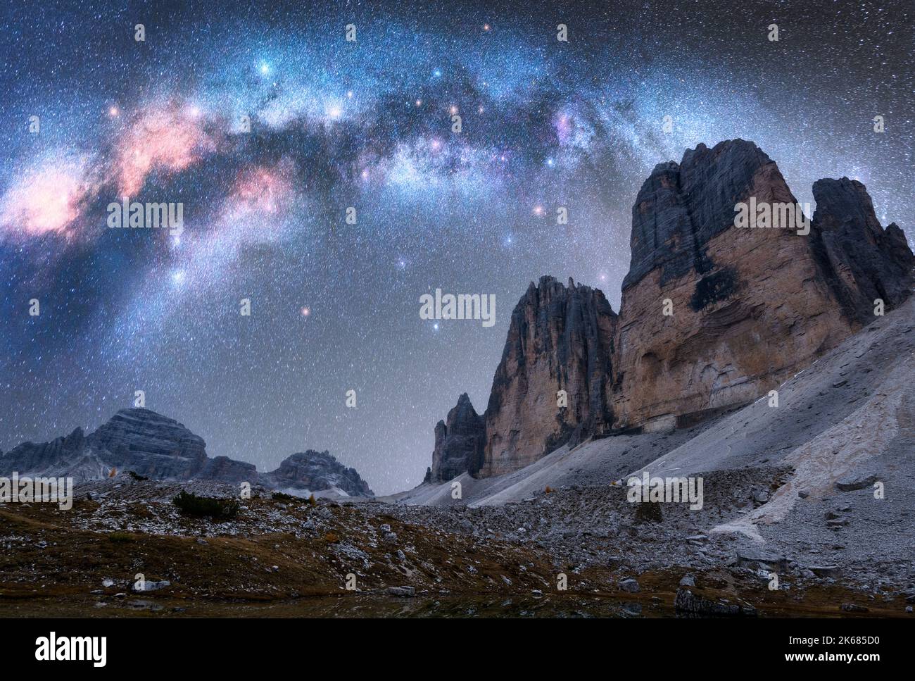 Milky Way arch over mountain peaks at night in summer Stock Photo - Alamy