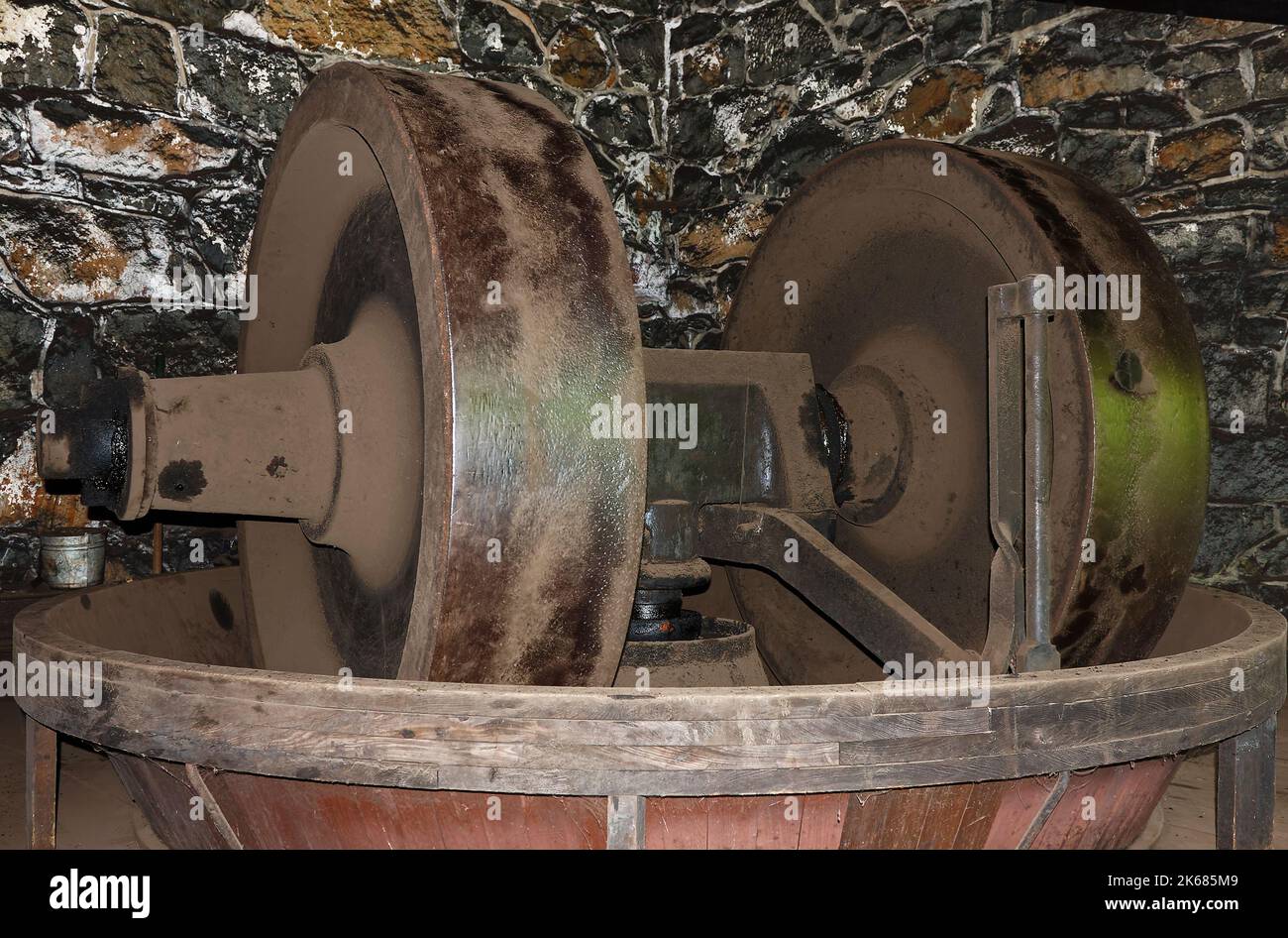 rolling wheel moving on top of gun powder, mixing, grinding, antique equipment, industry, motion, Eagle Roll Mill, Hagley Museum, Delaware, Wilmington Stock Photo