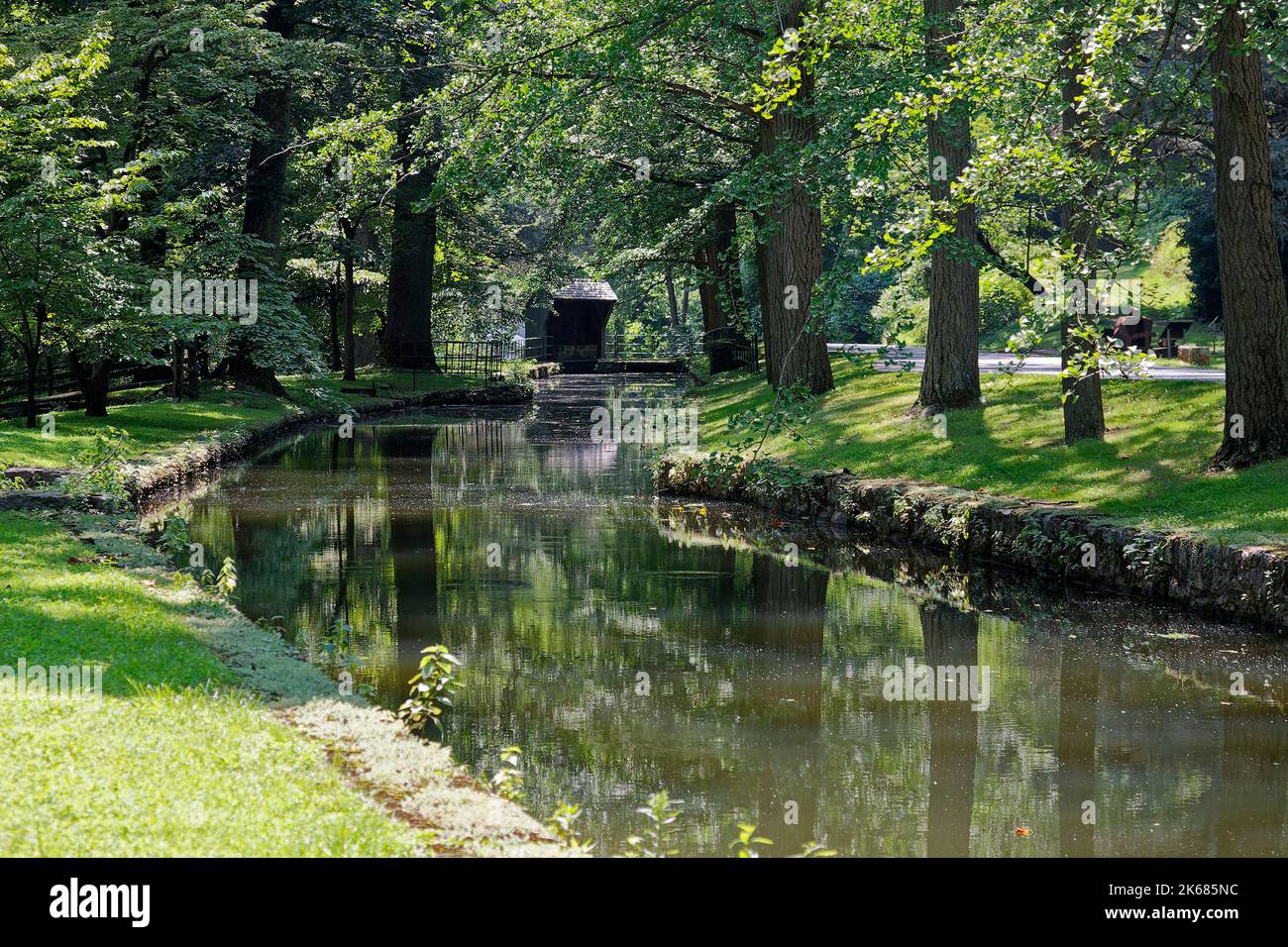 mill race, water, trees, grass, peaceful scene, reflections, green, Hagley Museum, Delaware, Wilmington, DE Stock Photo
