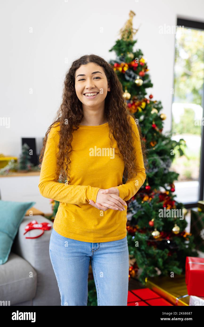 Woman happy christmas tree hi-res stock photography and images - Alamy