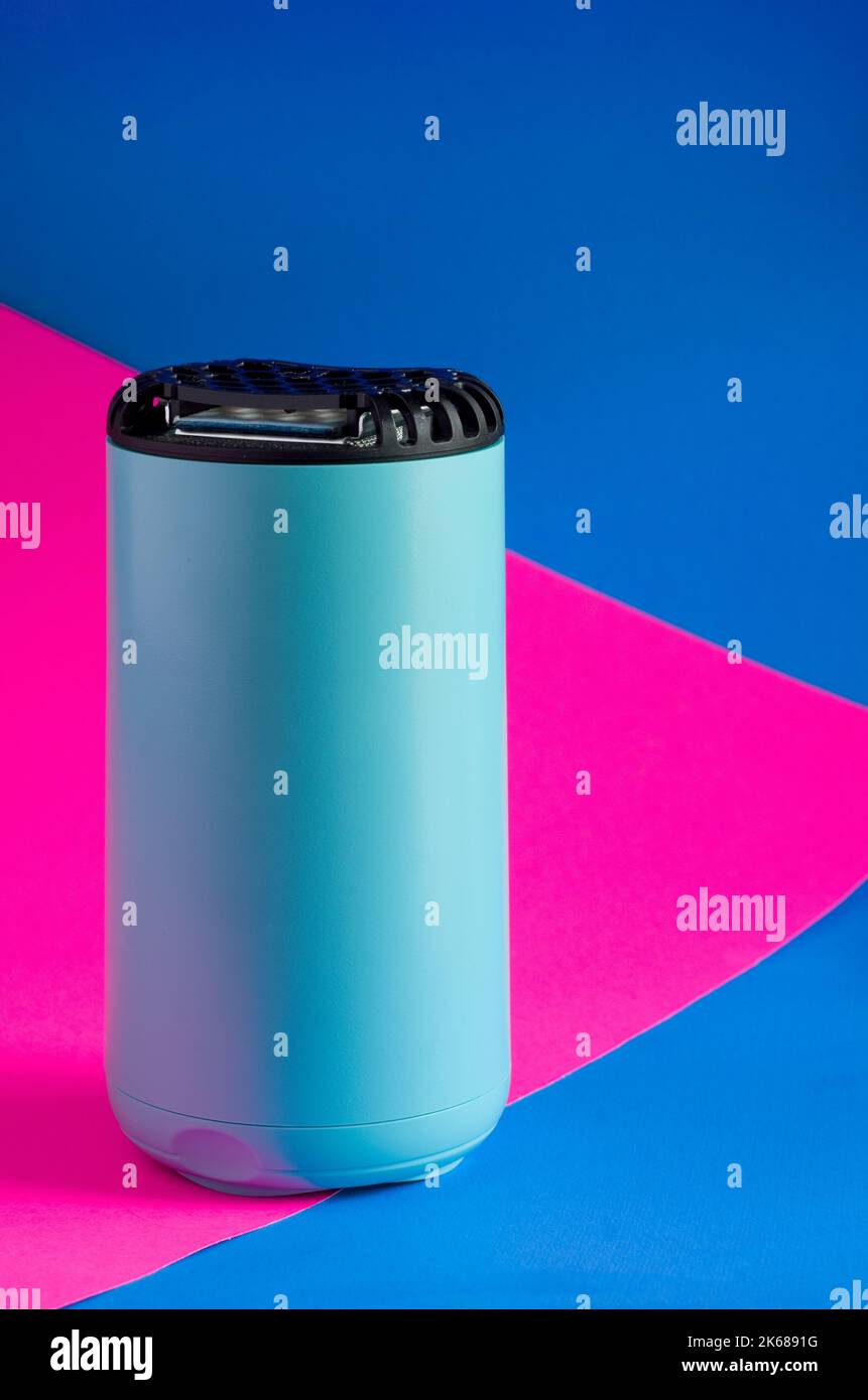 Electronic Mosquito Repellent Machine on Pink and Blue Background ...