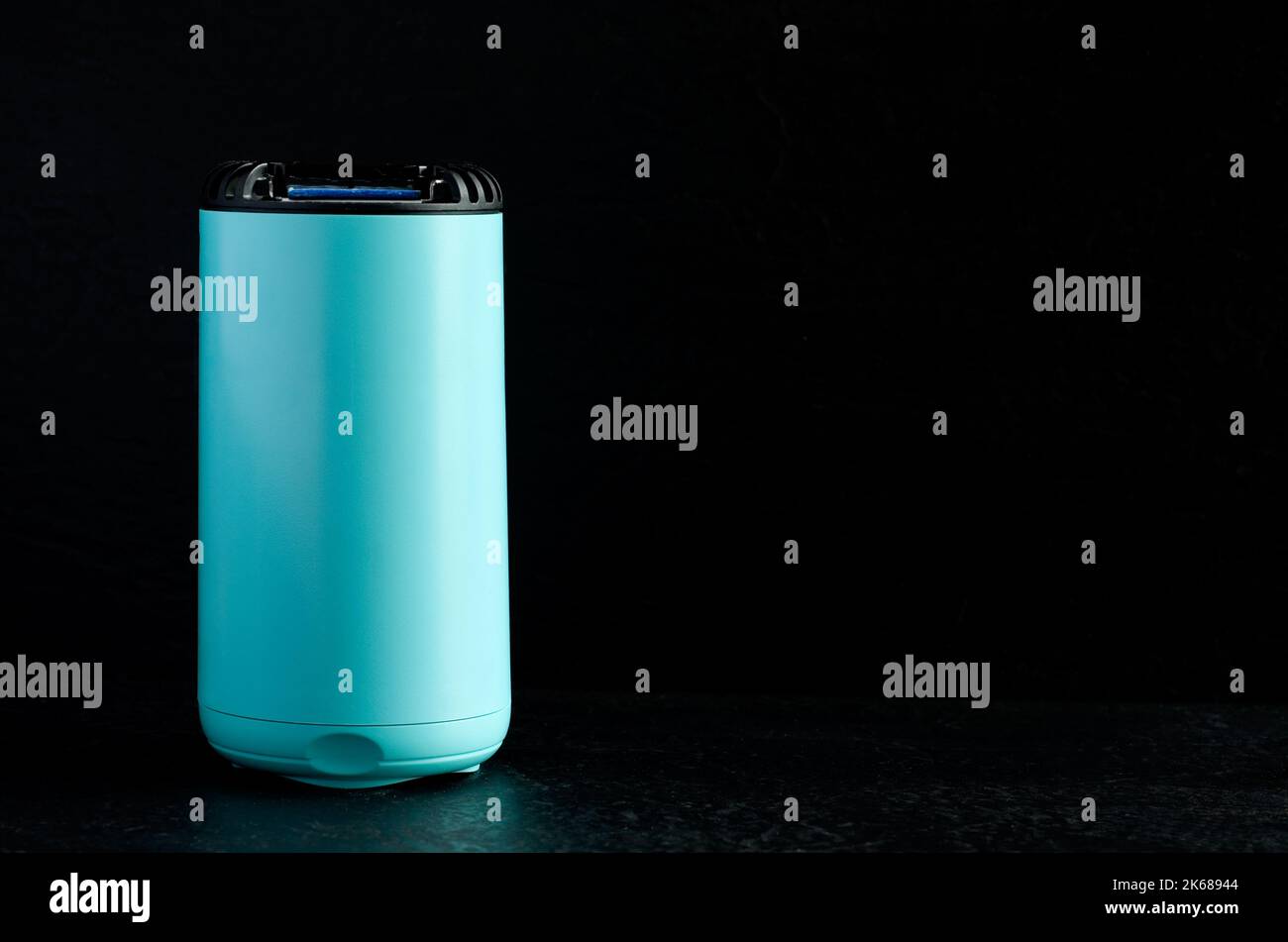 Electronic Mosquito Repellent Machine on Dark Background Horizontal ...