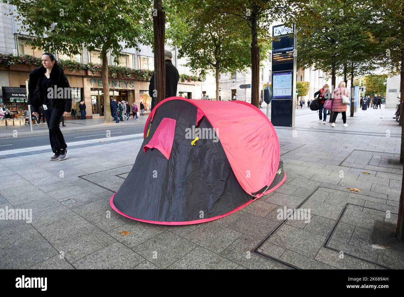 homeless camping out in the middle of oconnell street dublin republic of ireland Stock Photo