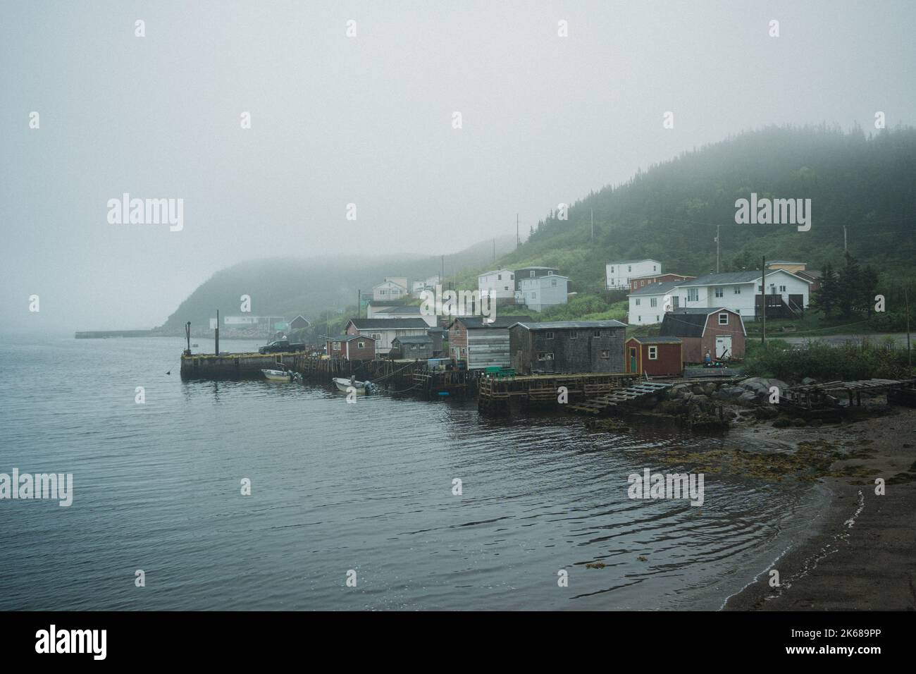 Small harbor on a foggy evening, Rose Blanche-Harbour le Cou, Newfoundland and Labrador, Canada Stock Photo
