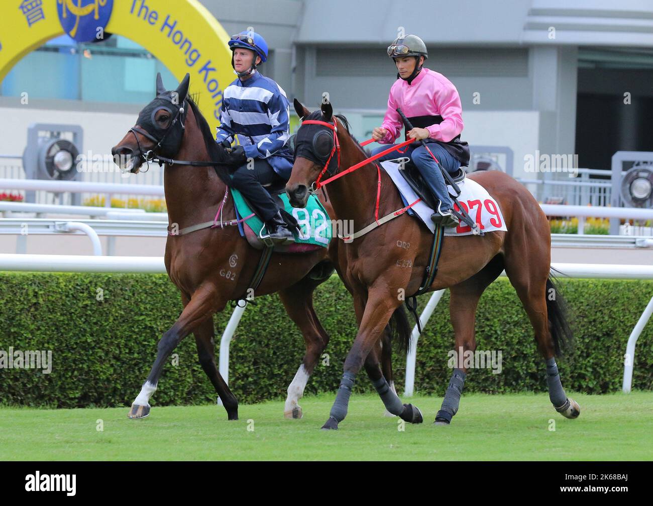 BEAUTY FIT(279) ridden by Alexis Badel and THE IRISHMAN(82) ridden by Zac Purton trial in batch 2 over 1000Metres (Turf) at Sha Tin. 27SEP22 SCMP / Kenneth Chan. Stock Photo