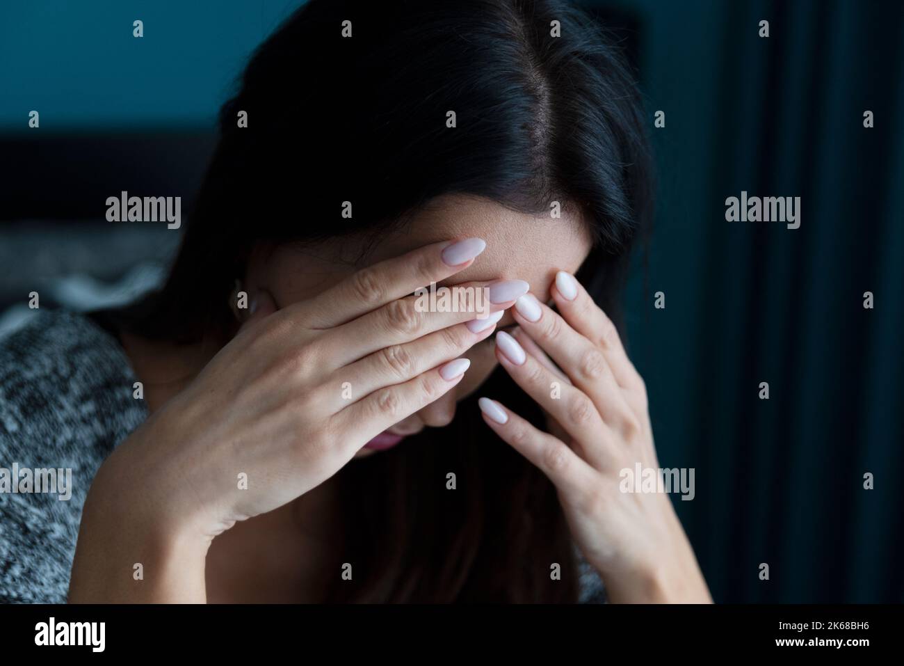 Woman suffering from depression. Sadness and headache concept Stock Photo