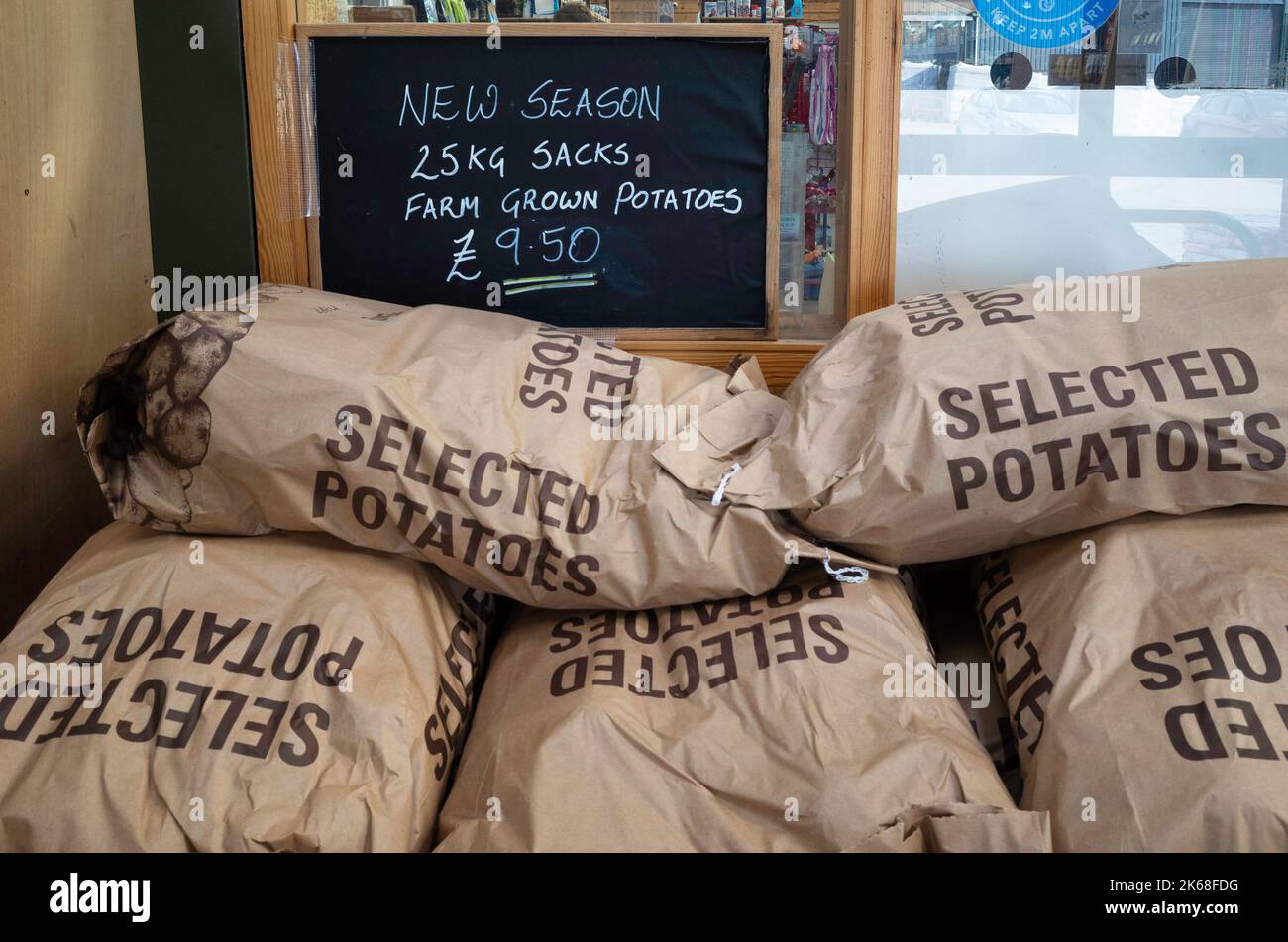 English potatoes in 25kg bags for sale priced at £9.50 in a Yorkshire farm shop October 2022 Stock Photo