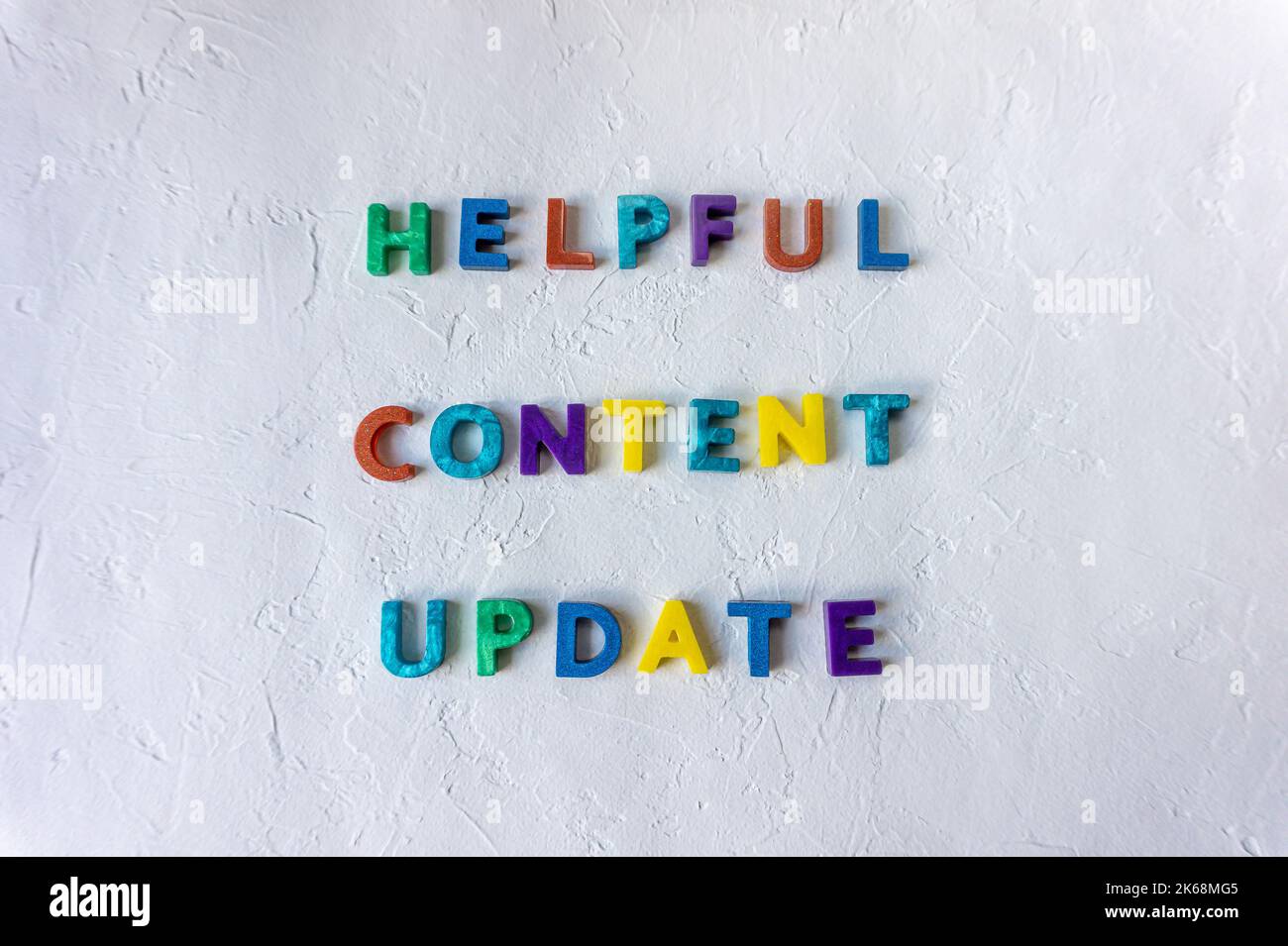 Helpful content update colorful sign on white background. Search algorithm update 2022. New signal for search engines. SEO term. Stock Photo
