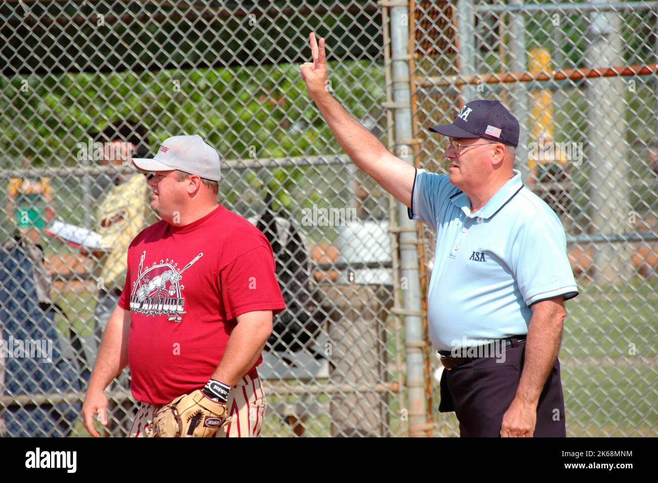 softball umpires for ASA in the US during games making calls and in