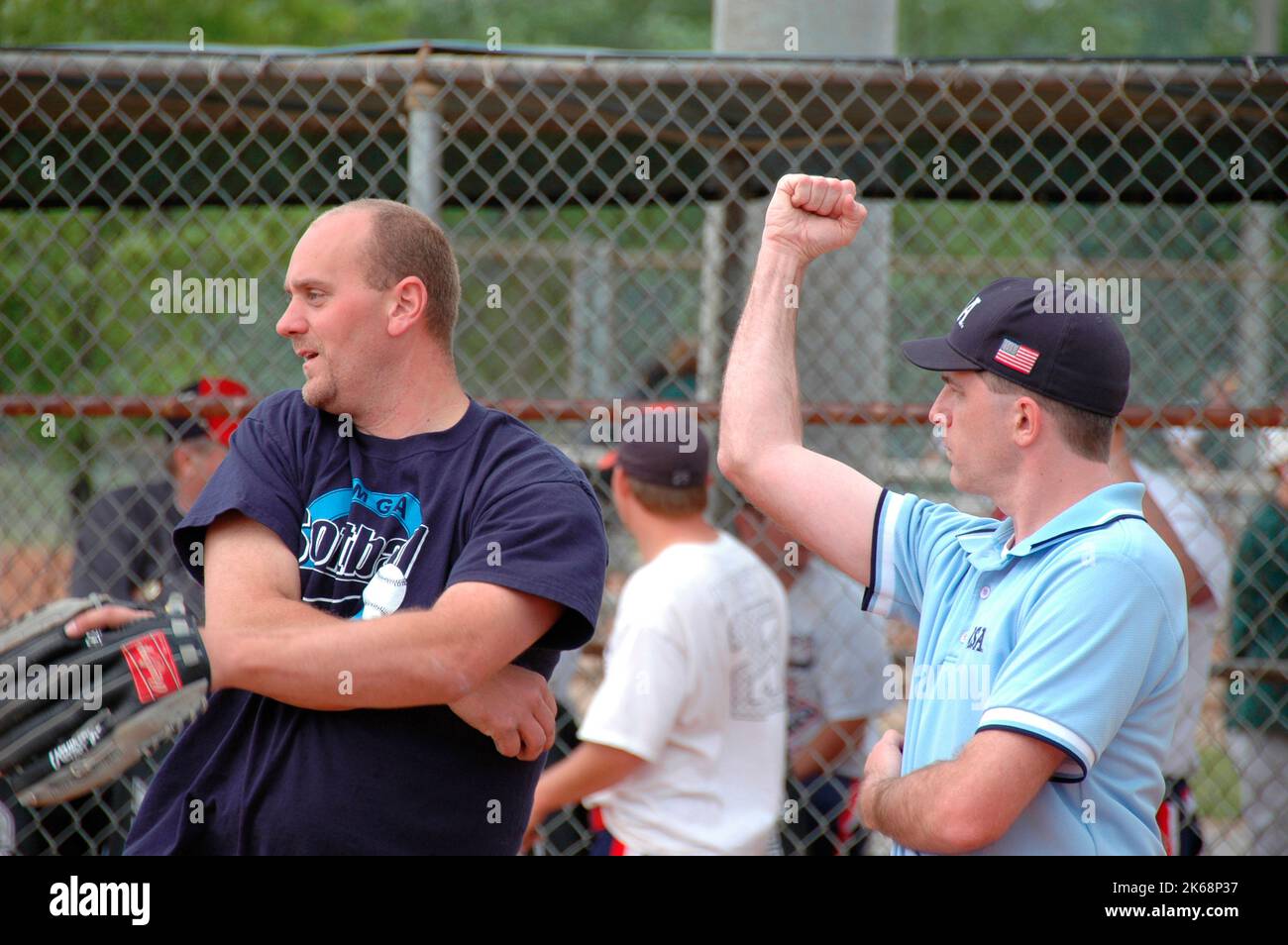 softball umpires for ASA in the US during games making calls and in