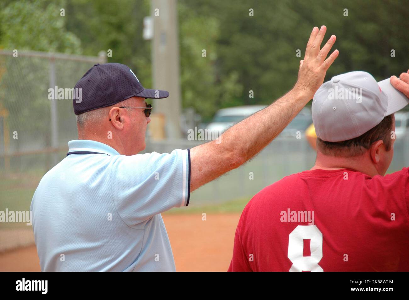 softball umpires for ASA in the US during games making calls and in