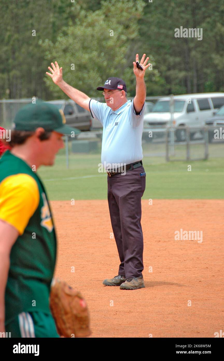 softball umpires for ASA in the US during games making calls and in