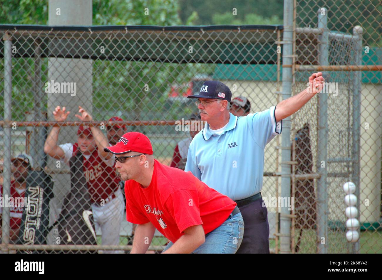 softball umpires for ASA in the US during games making calls and in