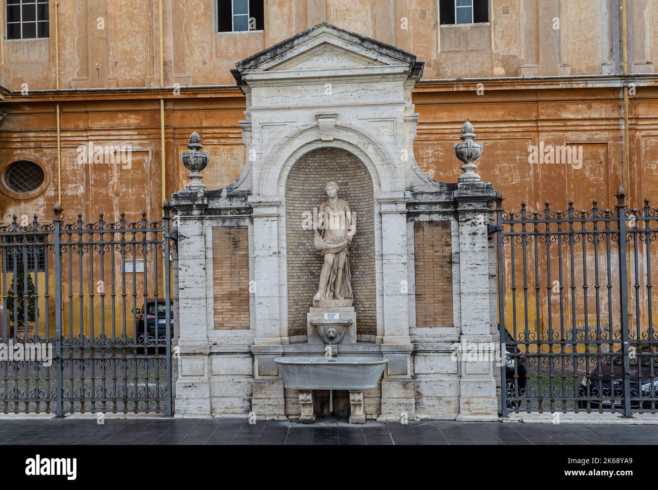 ROME, ITALY - DECEMBER 05, 2019:  Fountain in the inner courtyard of the Vatican Museum in Rome, Italy Stock Photo