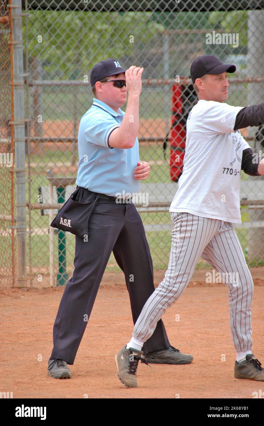 softball umpires for ASA in the US during games making calls and in