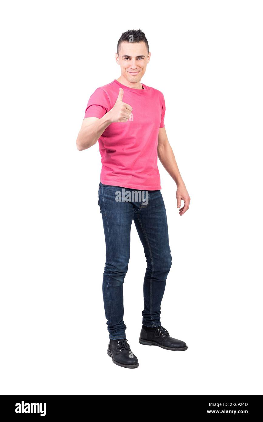 Content young guy showing thumb up and smiling Stock Photo
