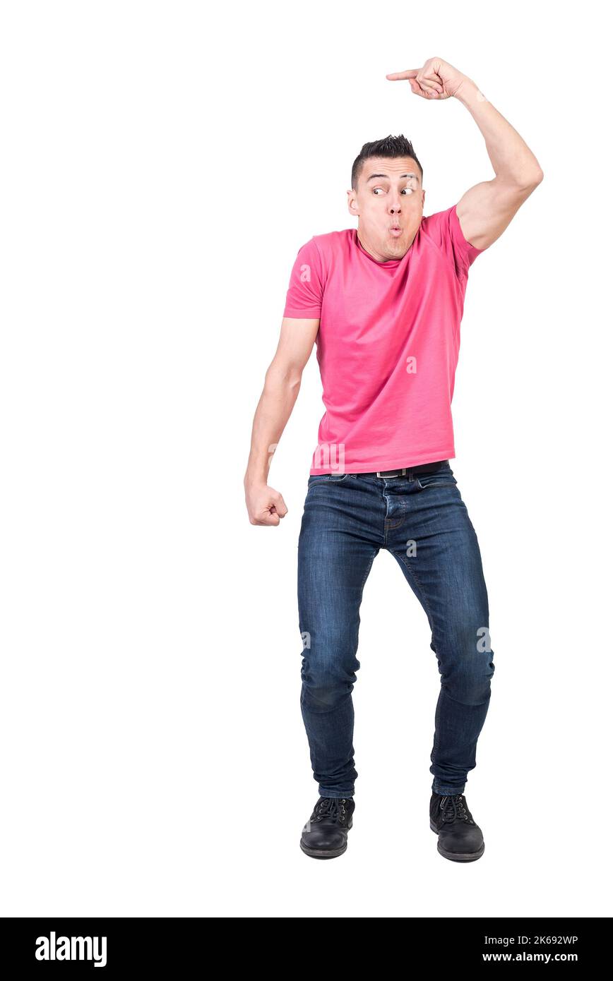 Careful man pointing aside in studio. White background Stock Photo