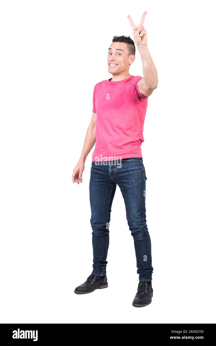 Cheerful man showing V sign. White background Stock Photo
