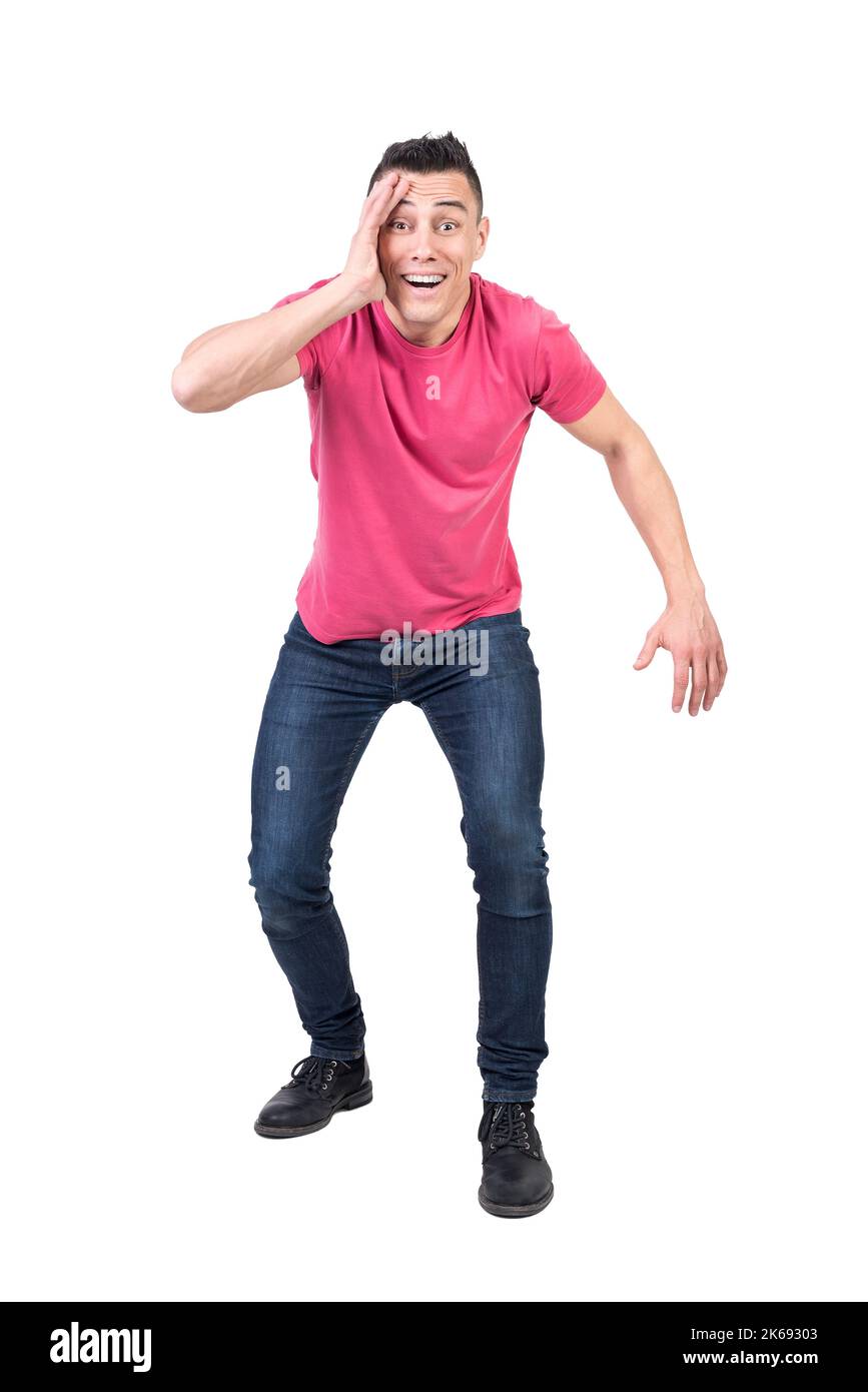 Astonished man touching face in studio. White background Stock Photo