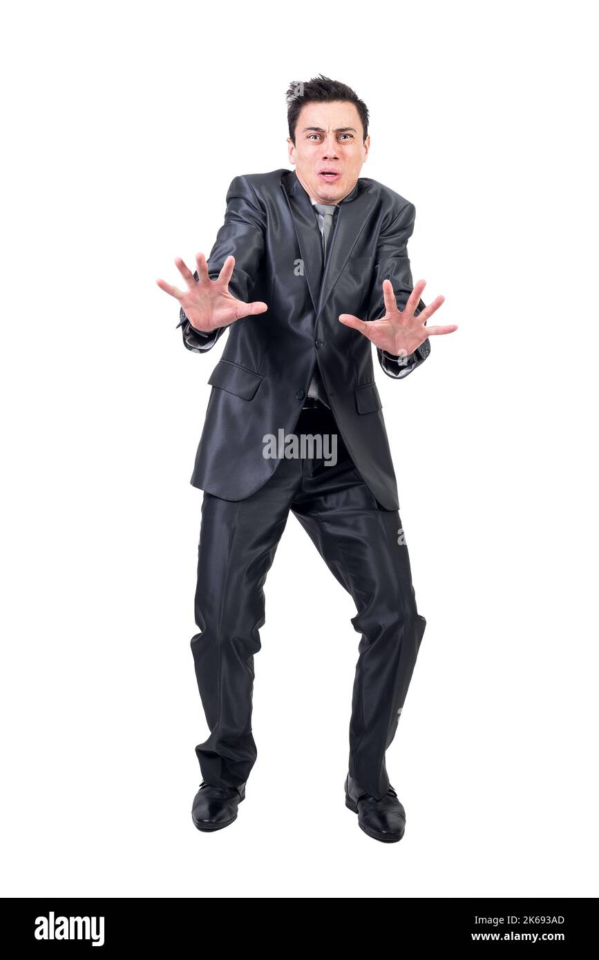 Frighted man in elegant suit. White background. Stock Photo
