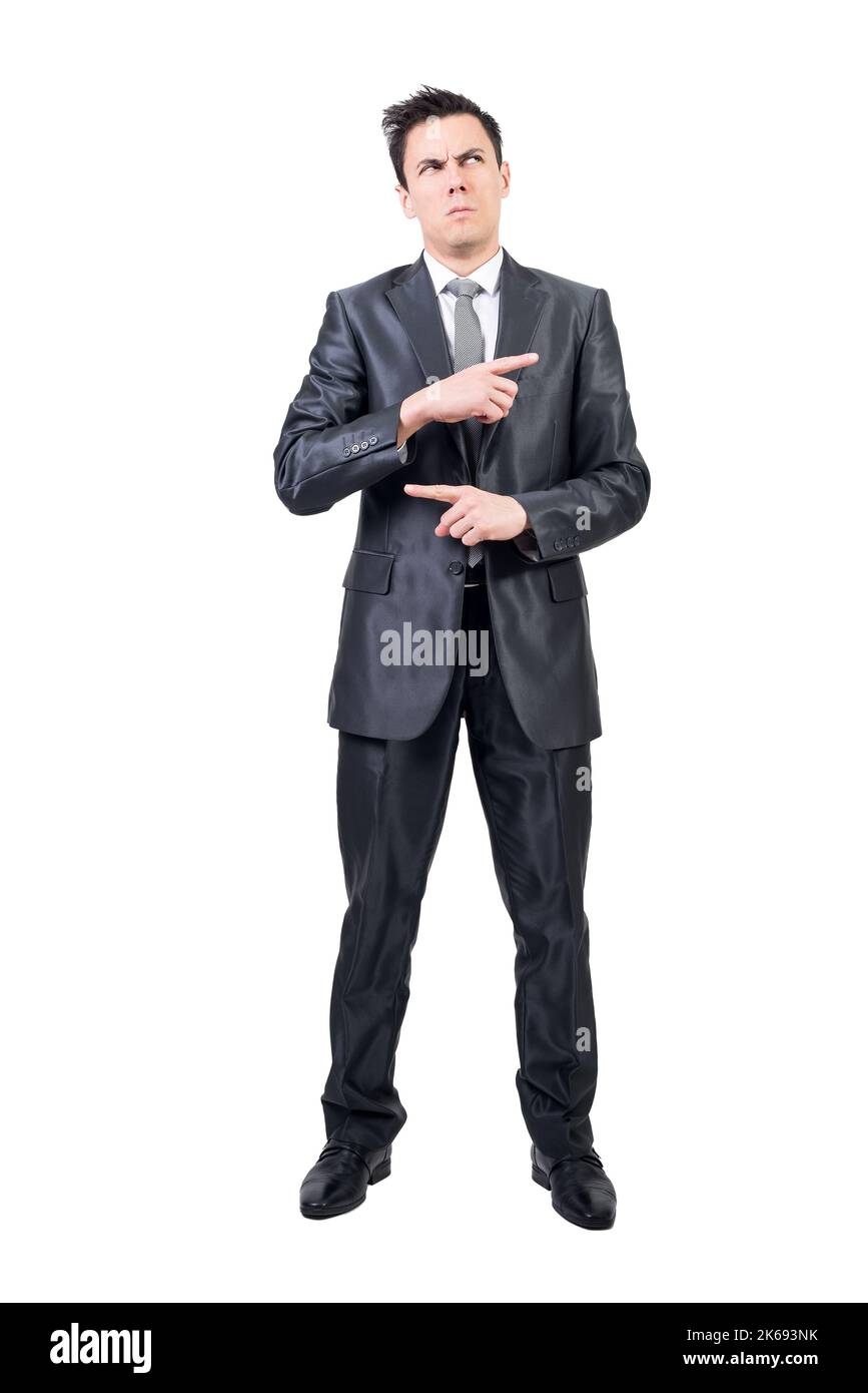 Confused man in elegant suit. White background. Stock Photo