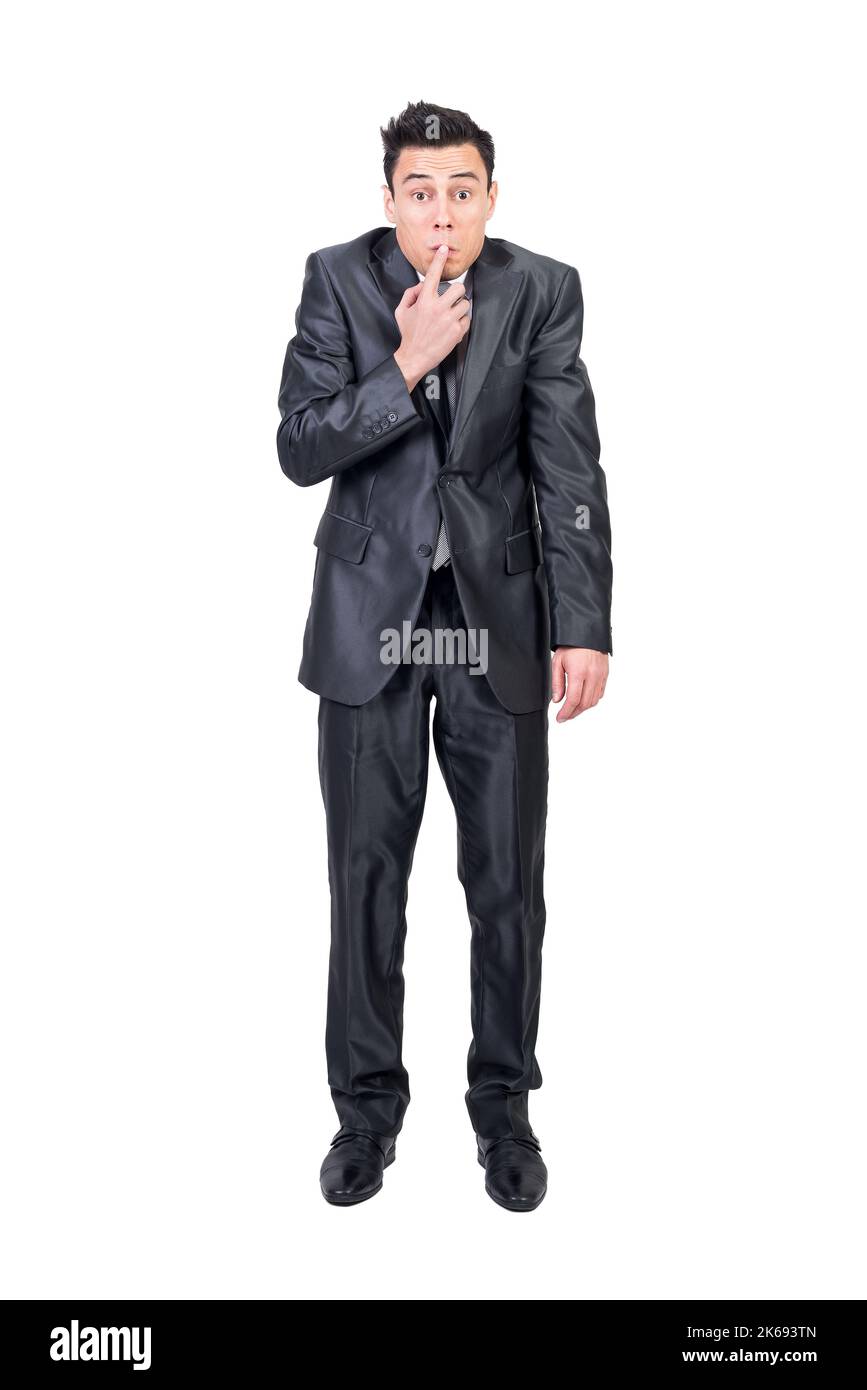 Hiding man in elegant suit. White background. Stock Photo