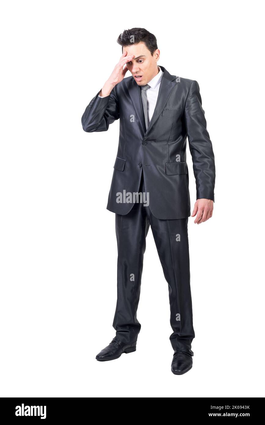Concerned businessman making mistake and touching forehead Stock Photo ...