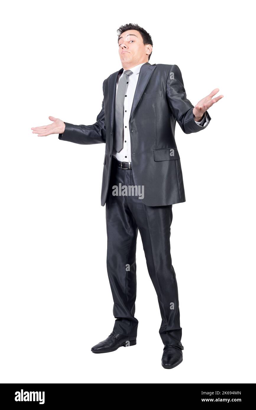 Confused male worker shrugging shoulders in studio Stock Photo - Alamy