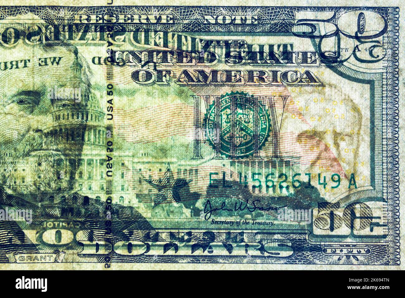 A United States of America 50 dollar bill has been backlit in order for the security watermark image portrait of President Ulysses S. Grant Stock Photo