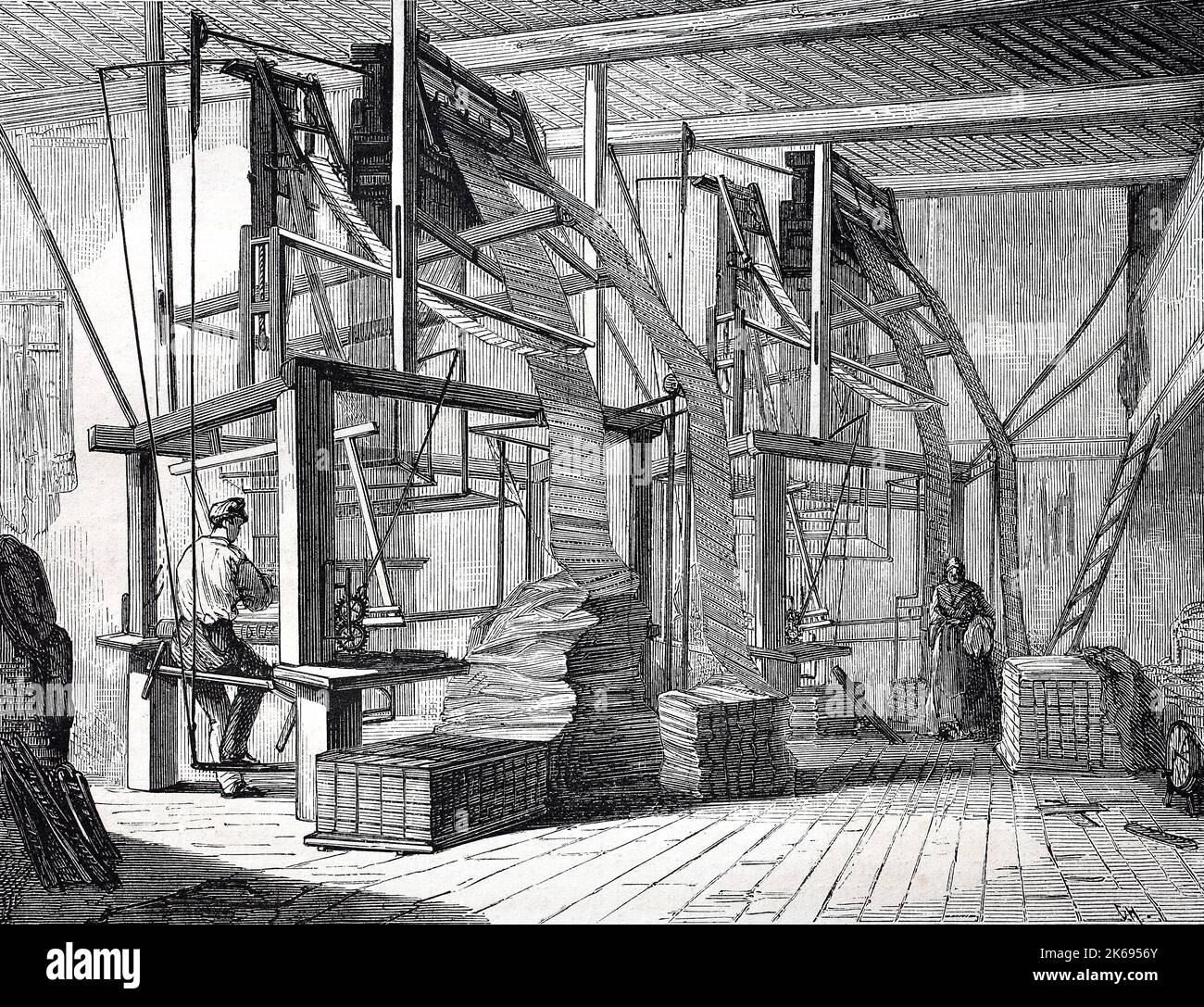 Digital improved reproduction, atelier for the production of silk fabric, original woodprint from th 19th century Stock Photo