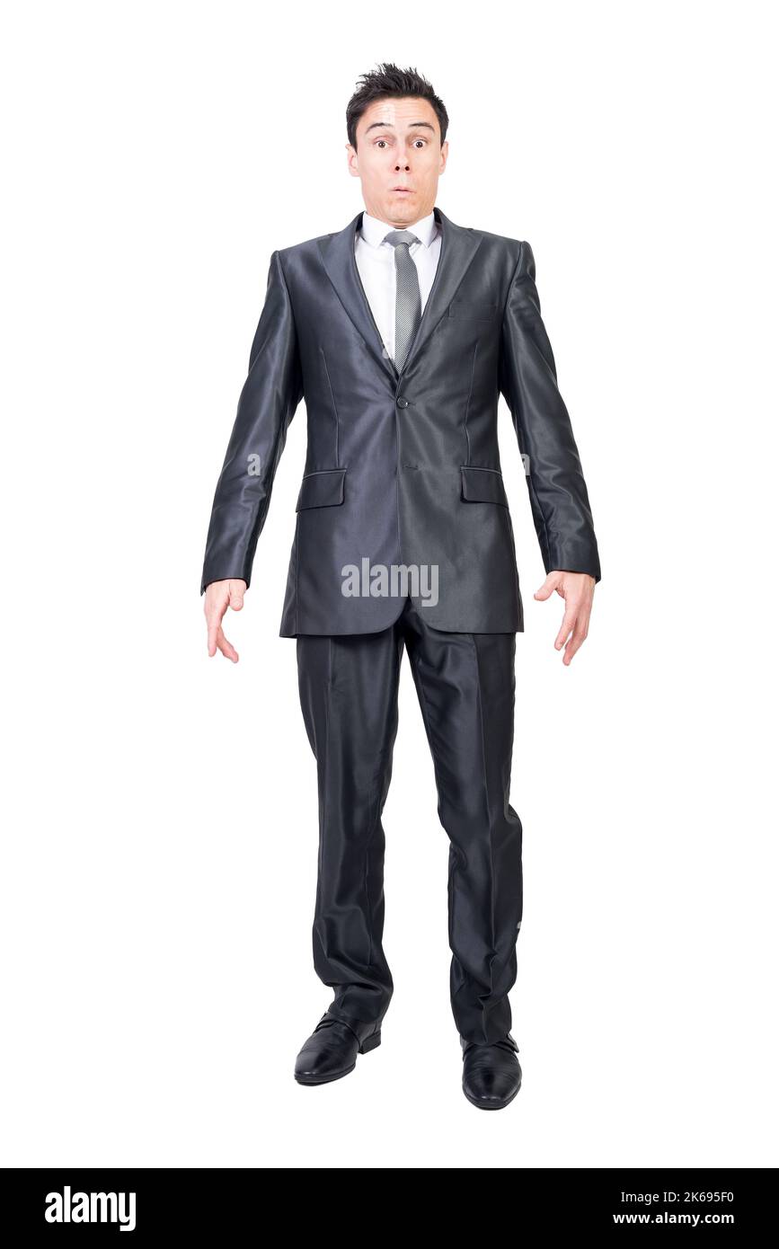 Surprised male employee looking at camera in white studio Stock Photo