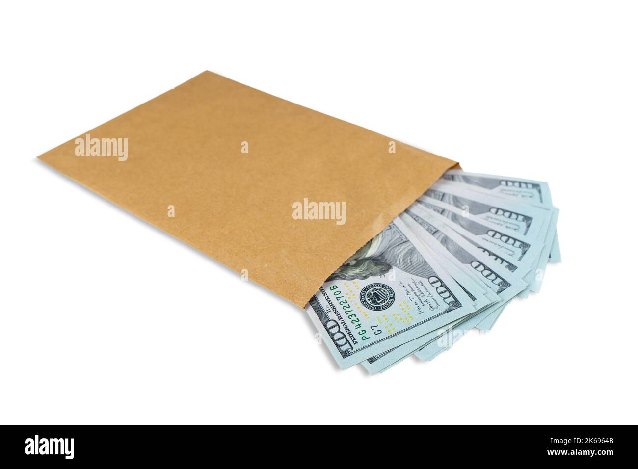 Pile of new design US dollar bills in brown envelope isolated on white