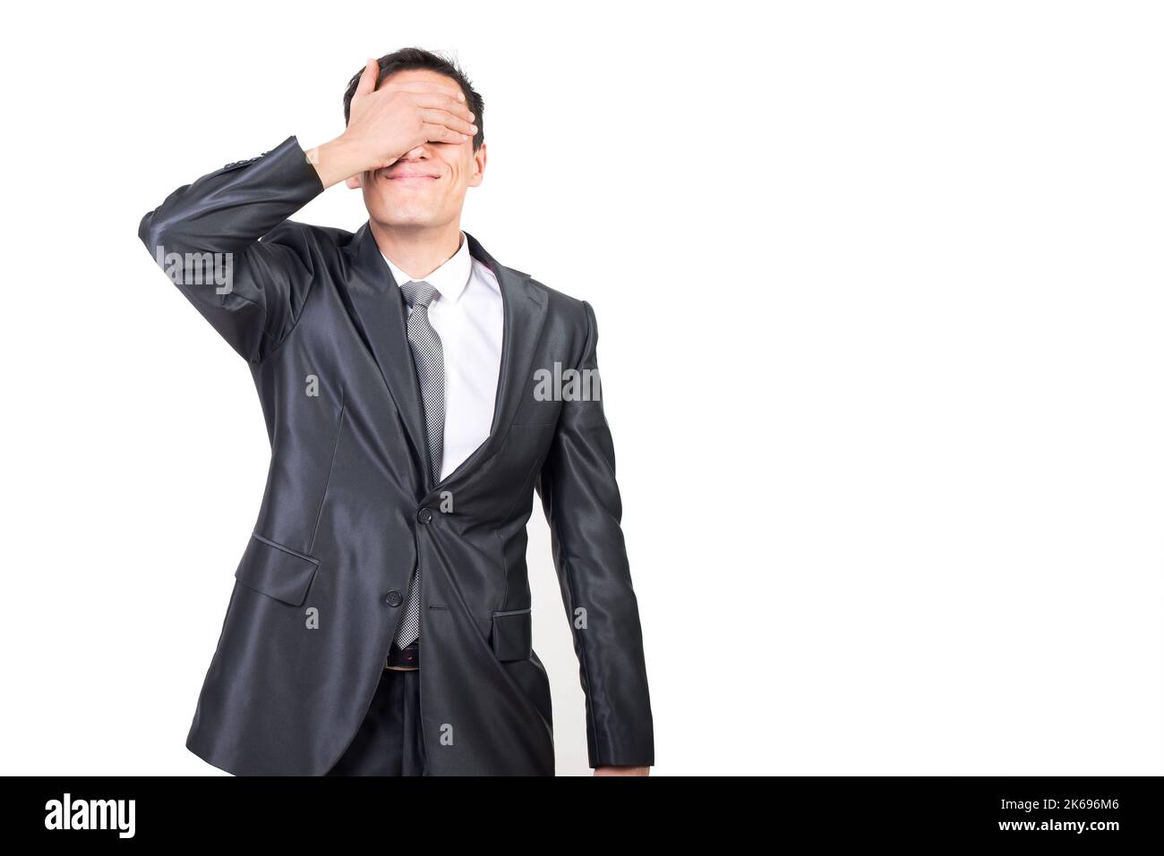 Adult surprised man in costume covered eyes with hand Stock Photo - Alamy